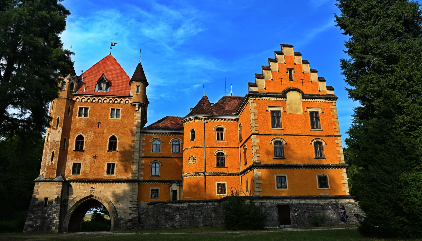 The yellow facade and turrets of Maruševec Castle